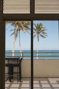 Absolute Beachfront Studio with Kitchen & Balcony
