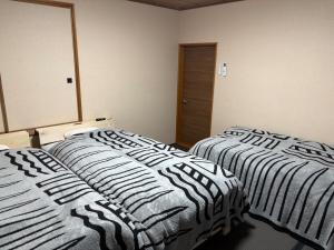 NewOpen 札幌中心部まで10分 好立地の一棟貸切り-S-beds-9台-駐車場2台有り-ゲストハウスR