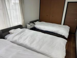 NewOpen 札幌中心部まで10分 好立地の一棟貸切り-S-beds-9台-駐車場2台有り-ゲストハウスR