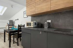 Cosy Studio with Air Conditioning by Noclegi Renters