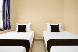 Hotel O near Universitas Sumatera Utara formerly Golden Cempaka Guest House