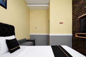Hotel O near Mall Boemi Kedaton formerly House Of Tuwuh 2