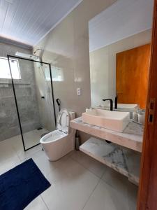 Casa com hidro privativa
