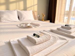 ATEA Poolside Apartments & Steps from the Beach