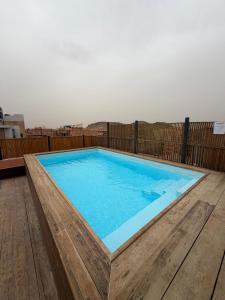 Appartement au centre-ville avec piscine