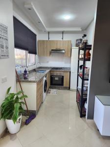 Appartement avec piscine & jardin près de la plage