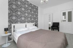 Apartament z Balkonem na 10 Piętrze w Łodzi by Noclegi Renters