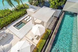 Modern Luxury Beachfront Vacation Home - Footprints