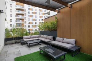 3-Bedroom Wola Apartment with Garden Tarrace