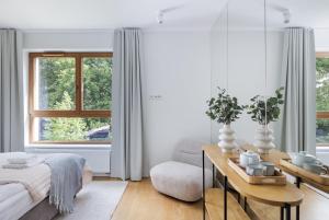 3-Bedroom Wola Apartment with Garden Tarrace