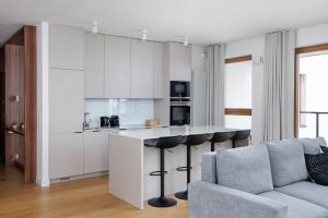 3-Bedroom Wola Apartment with Garden Tarrace
