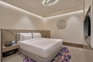 Swirl Transit Hotel Navi Mumbai by Adani