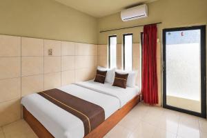 Hotel O near Garuda Wisnu Kencana formerly Bukit Hijau Residence