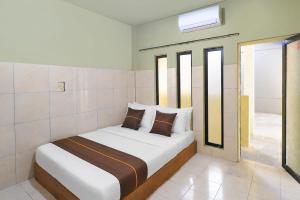 Hotel O near Garuda Wisnu Kencana formerly Bukit Hijau Residence