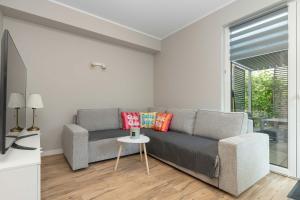 Przytulne Apartamenty z Parkingiem by Noclegi Renters
