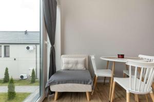 Przytulne Apartamenty z Parkingiem by Noclegi Renters