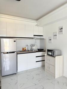 Elegant 1BR in Avida Towers with Netflix & Pool
