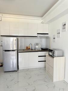 Elegant 1BR in Avida Towers with Netflix & Pool