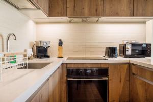Descubre la Elegancia 2 habitaciones en Las Condes