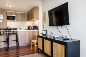 Descubre la Elegancia 2 habitaciones en Las Condes