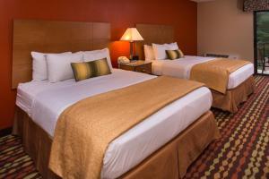 Queen Room with Two Queen Beds and Pool View room in Best Western Ambassador Inn & Suites