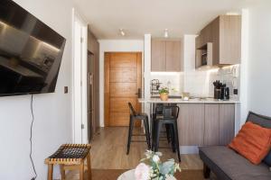 Discover Nunoa Cozy 1BR with Local Charm