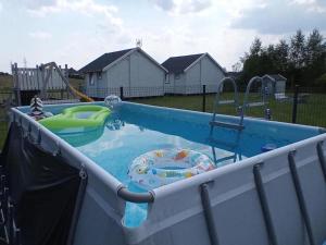 Family holiday homes, playground, summer pool