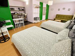 Suite Verde amplia para 6 huéspedes Espacios cómodos, diseño relajante y ubicación céntrica