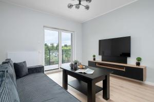 Przestronne Apartamenty z Parkingiem i Balkonem w Łodzi by Noclegi Renters