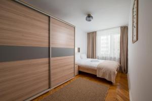 Szczęśliwicka Homely Apartment by BookingHost