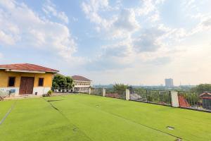 Kampung Abdi Resort Syariah Mitra RedDoorz