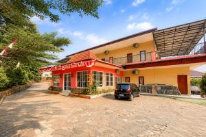 Kampung Abdi Resort Syariah Mitra RedDoorz