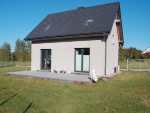 Half of a holiday home with a large garden