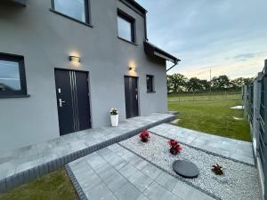 Half of a holiday home with a large garden