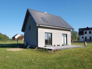 Half of a holiday home with a large garden