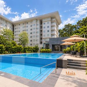 Maia Escapes Bulacan Staycation 5 mins to SM tungko studio w balcony pool view at Amaia Steps Altaraza