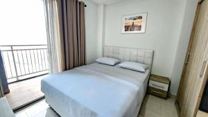 Apartement Springwood By LiviRooms Tangerang