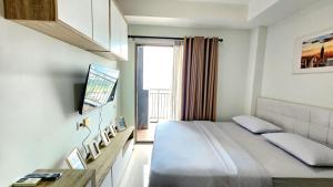 Apartement Springwood By LiviRooms Tangerang