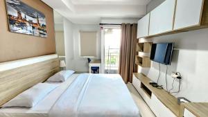 Apartement Springwood By LiviRooms Tangerang