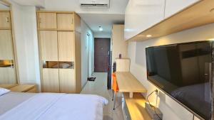 Apartement Springwood By LiviRooms Tangerang
