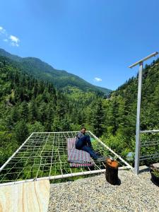 A frame Glass Cabin - Hammock & candlelight setup