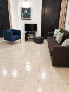 Apartamento en el centro de Ponce - con 2 camas, cocina y WiFi incluido