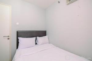 Comfort and Strategic 2BR at Bassura City Apartment By Travelio