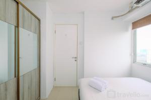 Comfort and Strategic 2BR at Bassura City Apartment By Travelio