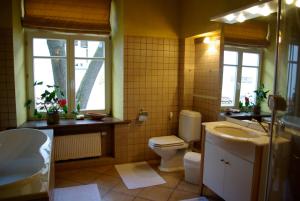 One-Bedroom Apartment (2 Adults + 2 Children) room in Pilies Apartments