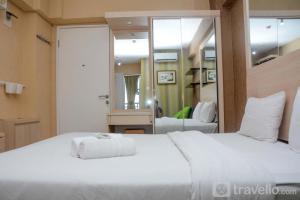 Comfort and Spacious Studio Room Bassura City Apartment By Travelio