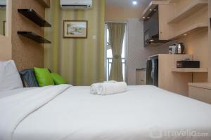 Comfort and Spacious Studio Room Bassura City Apartment By Travelio