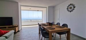 Las Palmeras - Seafront Apartment for 6 with Glazed Terrace and Marina Views