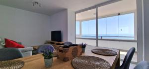 Las Palmeras - Seafront Apartment for 6 with Glazed Terrace and Marina Views