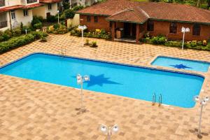 New Luxury 1BR Apartment F1 Pool Fully Equipped Kitchen Parking & Washing Machine Near Calangute & Baga Beach